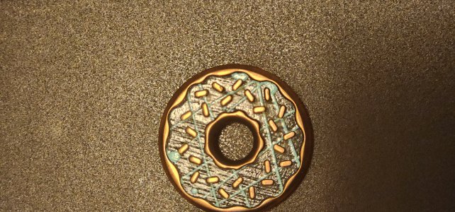 Black and light blue doughnut Tyson Lamb Ball Marker 